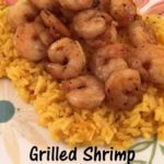 This Grilled Shrimp and Yellow Rice recipe is easy and delicious.