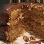 This easy Peanut Butter Cup cake recipe combines the flavors of chocolate and peanut butter with a yellow cake for a delightful dessert.
