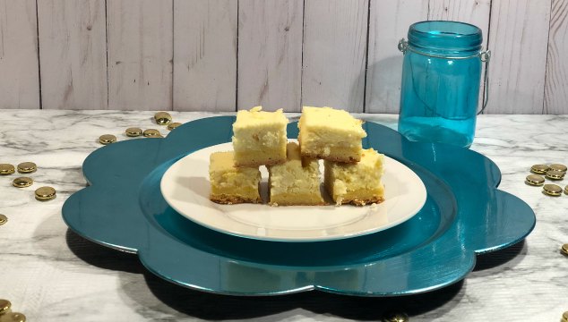 Did you know that you could make lemon cheesecake bars from a lemon cake mix? You can and the results are delicious!