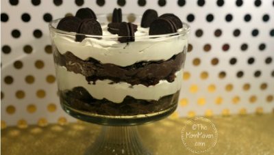 This beautiful Oreo Cheesecake Trifle is packed with Oreo cookies, creamy cheesecake, decadent chocolate ganache, fudgy brownies and fluffy Cool Whip.