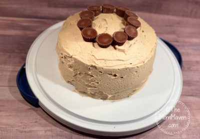 If you love chocolate and peanut butter together, you will love this Peanut Butter Cup Cake. It's Triple Chocolate Cake topped with Peanut Butter Cream Cheese Frosting filled and decorated with mini Reese's Peanut Butter Cups. Yum!